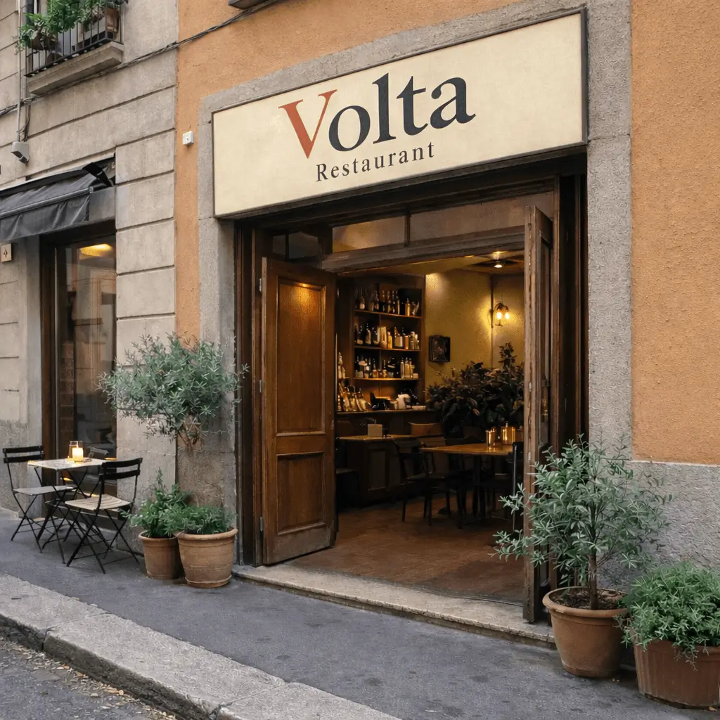 Insegna Volta Restaurant con logo rosso e nero sulla facciata